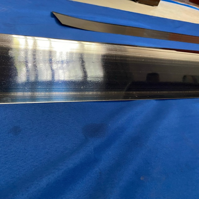 Lame de grattage à revêtement en alliage pour cylindre de séchage de fabrication de papier